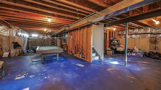 basement with water heater and billiards