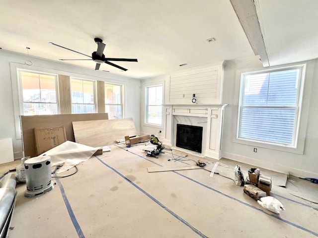 27 Spruce Rd, Ocean City, NJ 08226 - unfurnished living room with a fireplace and ceiling fan