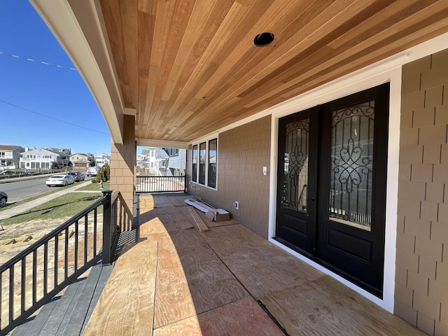 27 Spruce Rd, Ocean City, NJ 08226 - entrance to property featuring covered porch and a residential view