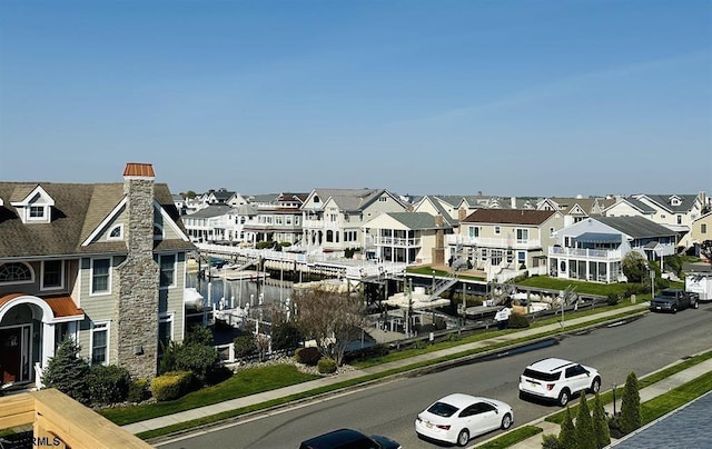 27 Spruce Rd, Ocean City, NJ 08226 - view of asphalt road featuring sidewalks, curbs, and a residential view
