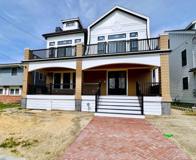 27 Spruce Rd, Ocean City, NJ 08226 - view of front of house featuring a porch and a balcony