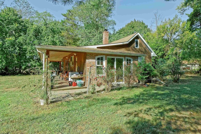 exterior space featuring a lawn