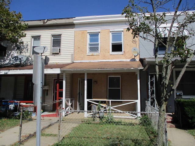 view of property with covered porch