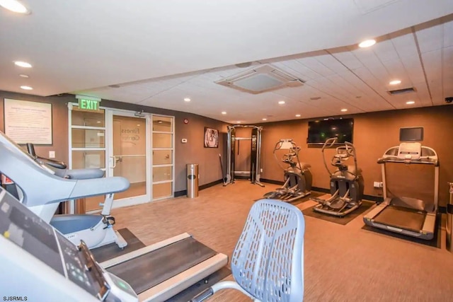 workout area with carpet floors