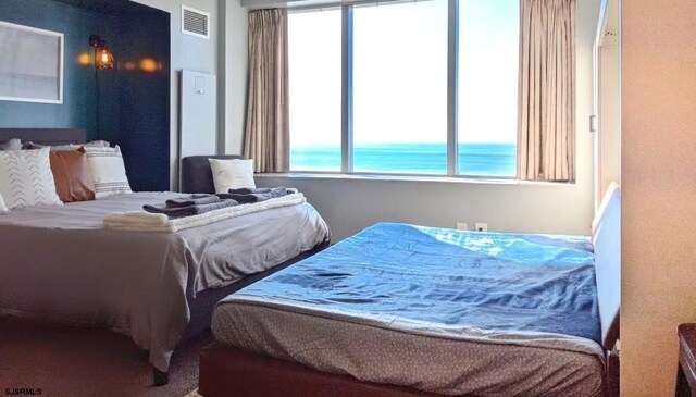 bedroom with a water view