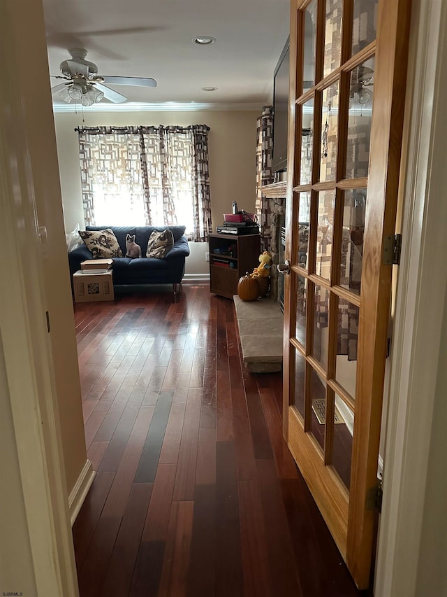 hallway with dark hardwood / wood-style flooring