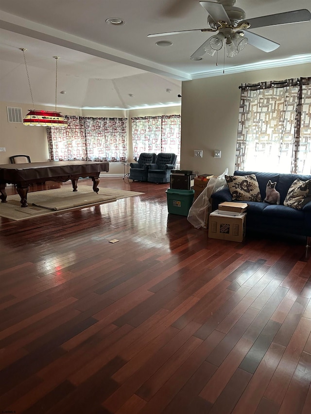 interior space featuring ceiling fan, dark hardwood / wood-style floors, pool table, and a wealth of natural light