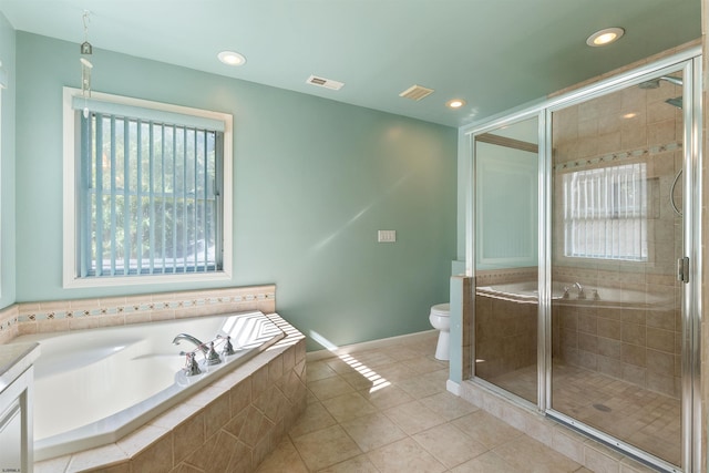 full bathroom with vanity, separate shower and tub, toilet, and tile patterned floors