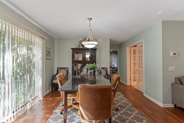 dining area featuring dark hardwood / wood-style floors