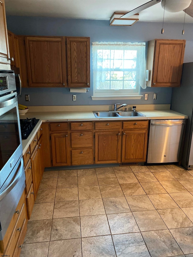 kitchen featuring appliances with stainless steel finishes and sink