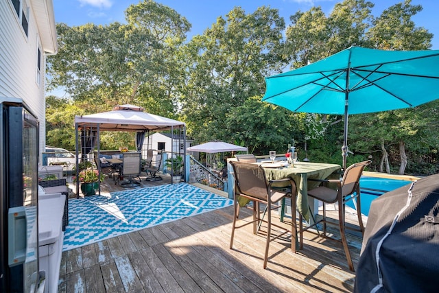 wooden deck with a gazebo