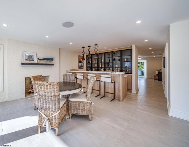 109 S 11th Ave, Longport, NJ 08403 - dining room featuring recessed lighting, baseboards, and bar area