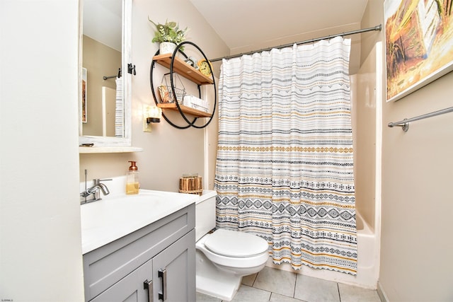 full bathroom featuring vanity, tile patterned flooring, toilet, and shower / tub combo