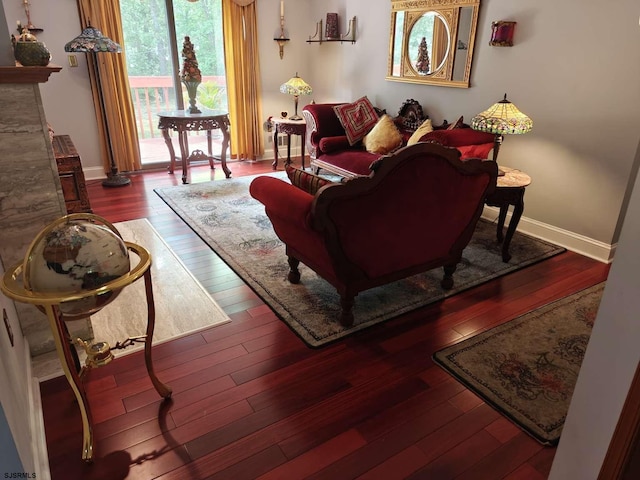 living room featuring dark wood-type flooring