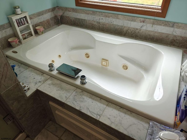 bathroom with a tub