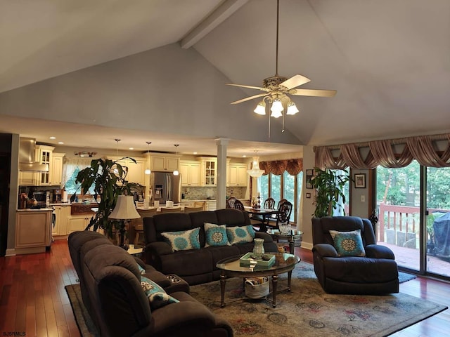 living room with wood-type flooring, ceiling fan, and a wealth of natural light