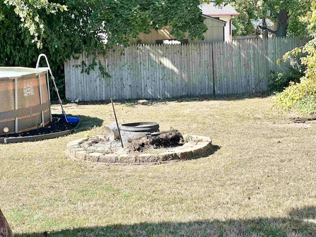 view of yard featuring central AC unit