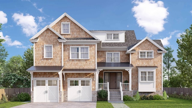 view of front facade featuring a front yard and a garage