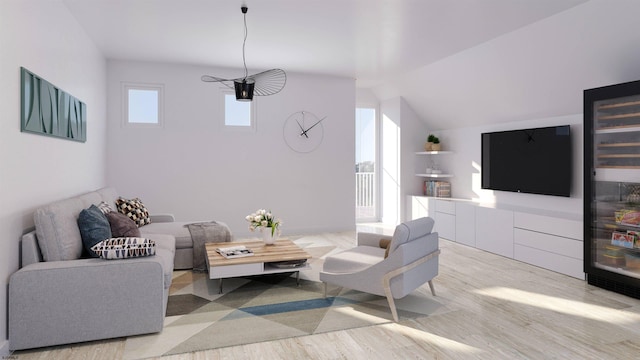 living room with lofted ceiling and light hardwood / wood-style floors