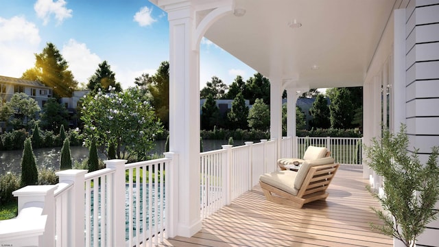 wooden deck featuring a water view