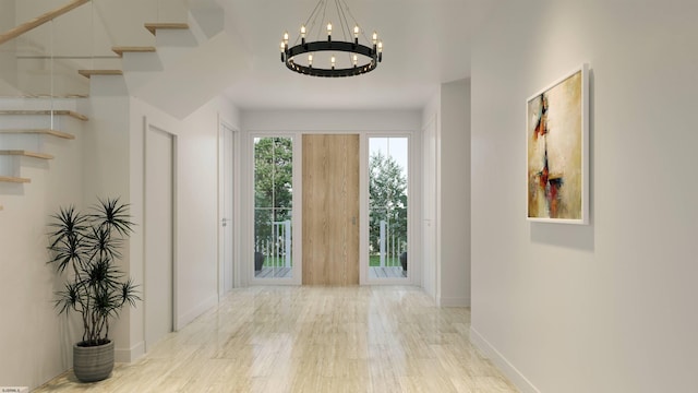 hallway with a notable chandelier and light hardwood / wood-style flooring