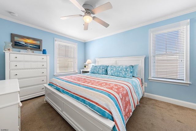 carpeted bedroom featuring ornamental molding, multiple windows, and ceiling fan