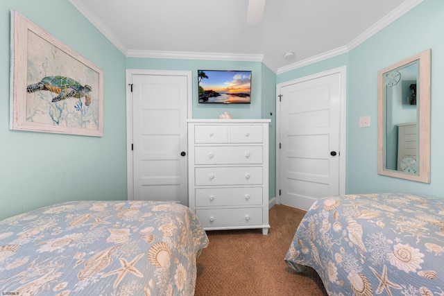 bedroom featuring dark carpet, a closet, crown molding, and ceiling fan