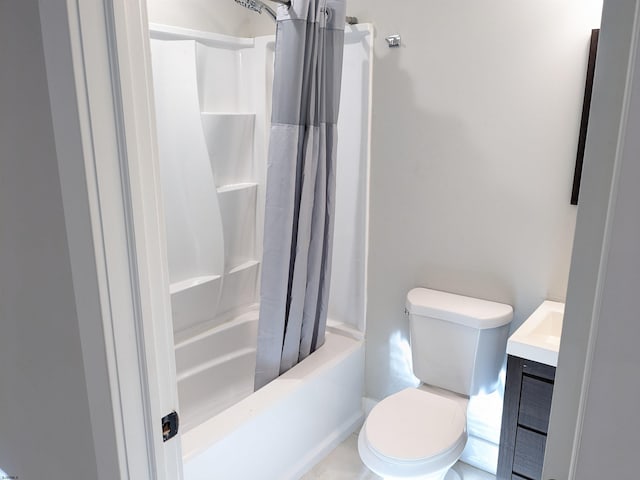 full bathroom featuring toilet, shower / tub combo with curtain, and vanity