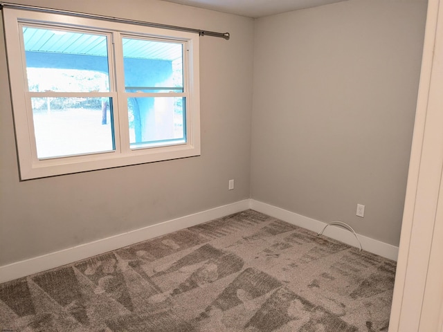 view of carpeted spare room