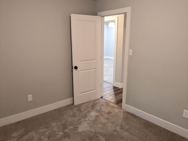 spare room featuring carpet floors