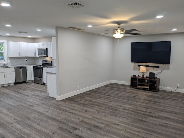2406 Oslo Ave, Mays Landing, NJ 08330 - living area featuring baseboards, dark wood-type flooring, ceiling fan, and recessed lighting
