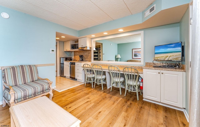 801 E 10th St Unit 255, Ocean City, NJ 08226 - interior space with light wood finished floors, recessed lighting, and visible vents