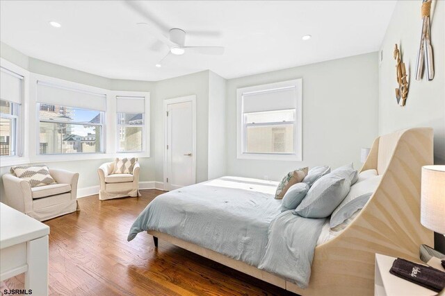 107 S Austin Ave, Ventnor, NJ 08406 - bedroom with multiple windows, wood finished floors, recessed lighting, and ceiling fan