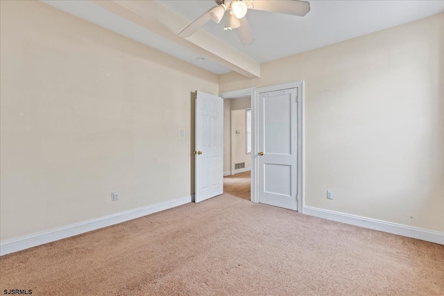 unfurnished bedroom with carpet flooring and ceiling fan