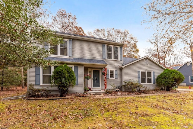 view of front property with a front yard