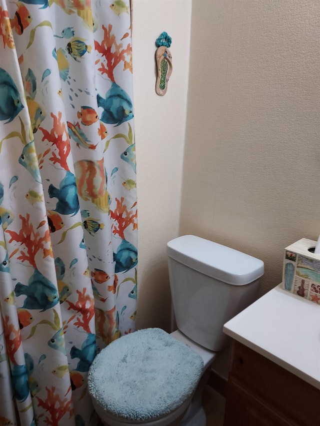 bathroom featuring toilet