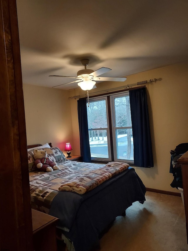 bedroom featuring carpet floors and ceiling fan