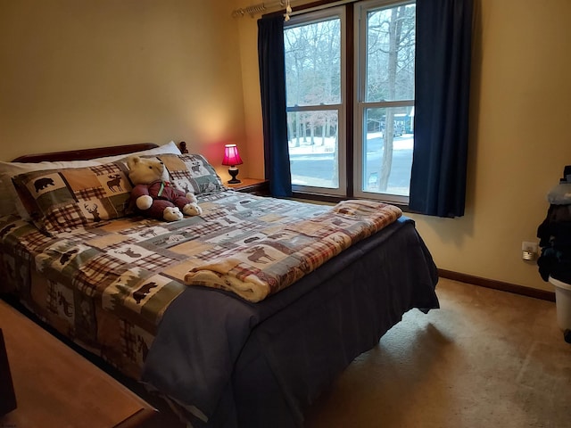 bedroom featuring carpet