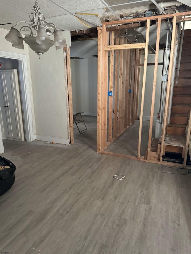 basement featuring hardwood / wood-style flooring