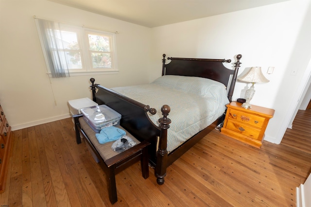 bedroom featuring wood-type flooring