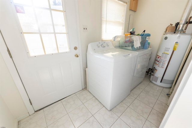 laundry room featuring washer and clothes dryer and gas water heater