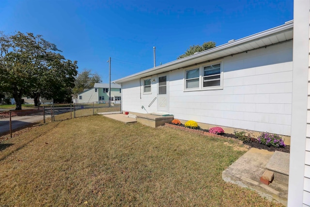 exterior space with a lawn