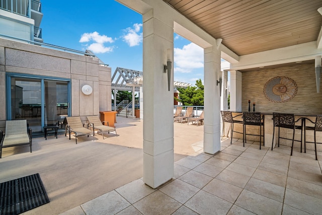 view of patio featuring a pergola