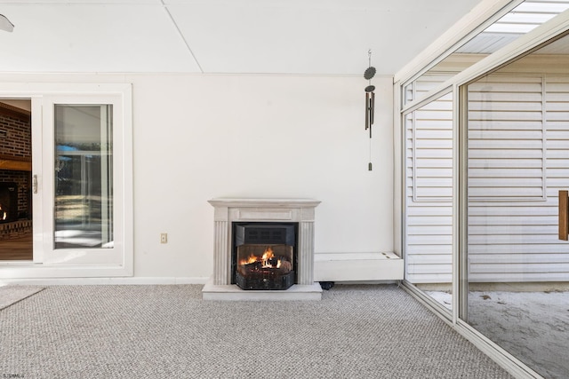 unfurnished living room with carpet floors