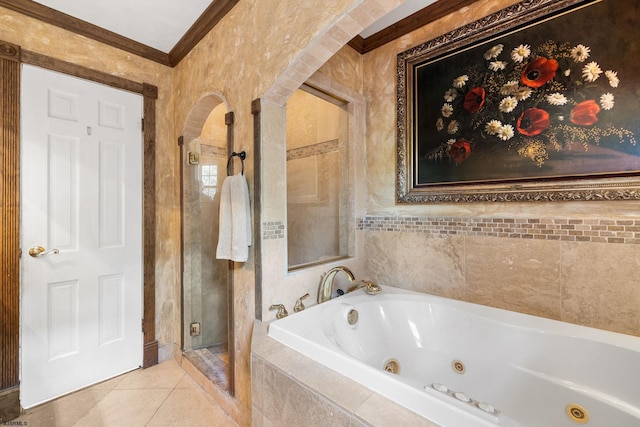 bathroom featuring tile patterned flooring, crown molding, and separate shower and tub