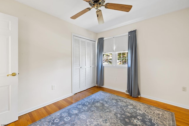 bedroom featuring a closet, ceiling fan, and hardwood / wood-style floors