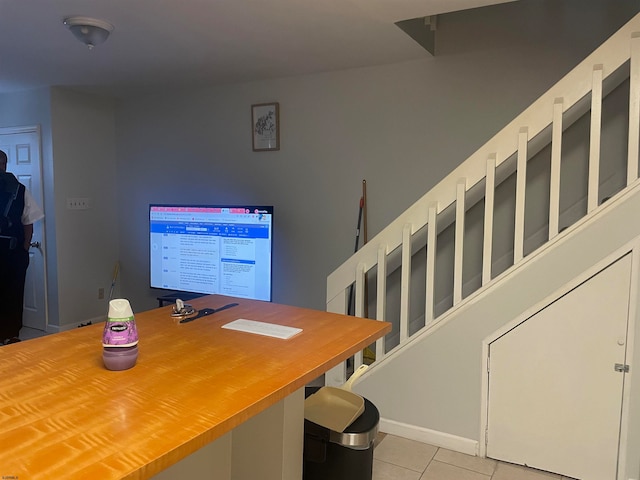 office with light tile patterned floors