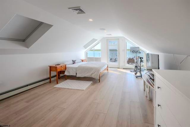 bedroom featuring lofted ceiling, access to exterior, light wood-type flooring, and a baseboard heating unit