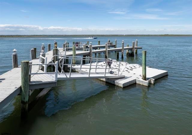 view of dock with a water view