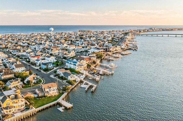 aerial view at dusk with a water view